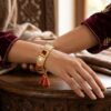 Yanki-16-5-7.jpg Zeenat Navratna Gold Polki Bracelet
